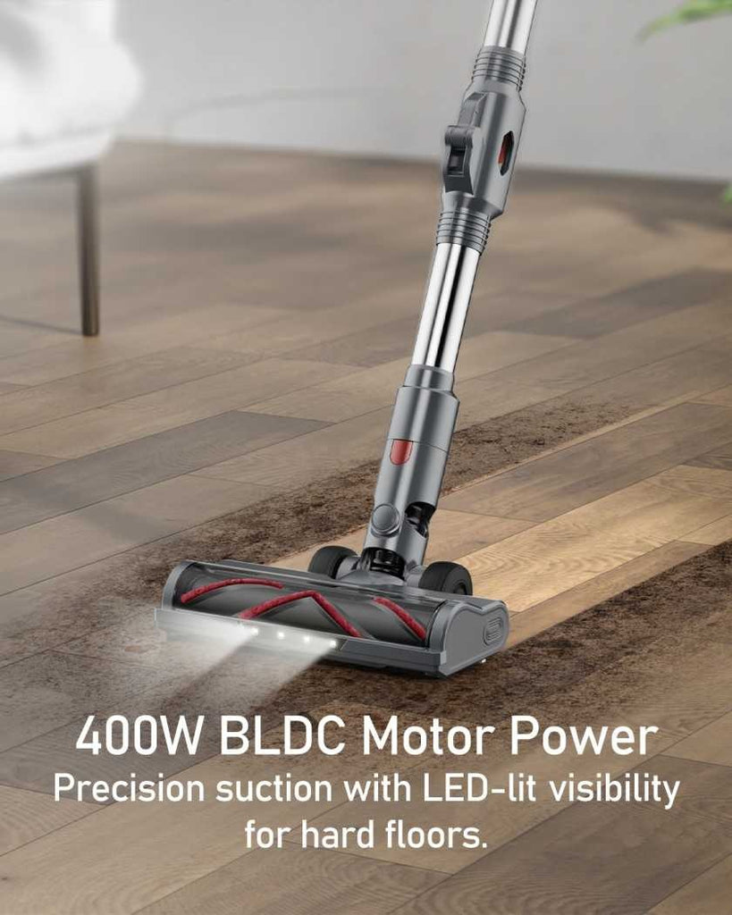 Vacuum cleaner cleaning a hard floor with text highlighting power and features.
