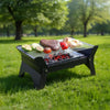 Compact Green Lion Qudra Foldable BBQ Grill in its folded, space-saving position.