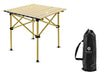 Toby's Portable Camping Table – 13, set up outdoors on grass with camping gear.